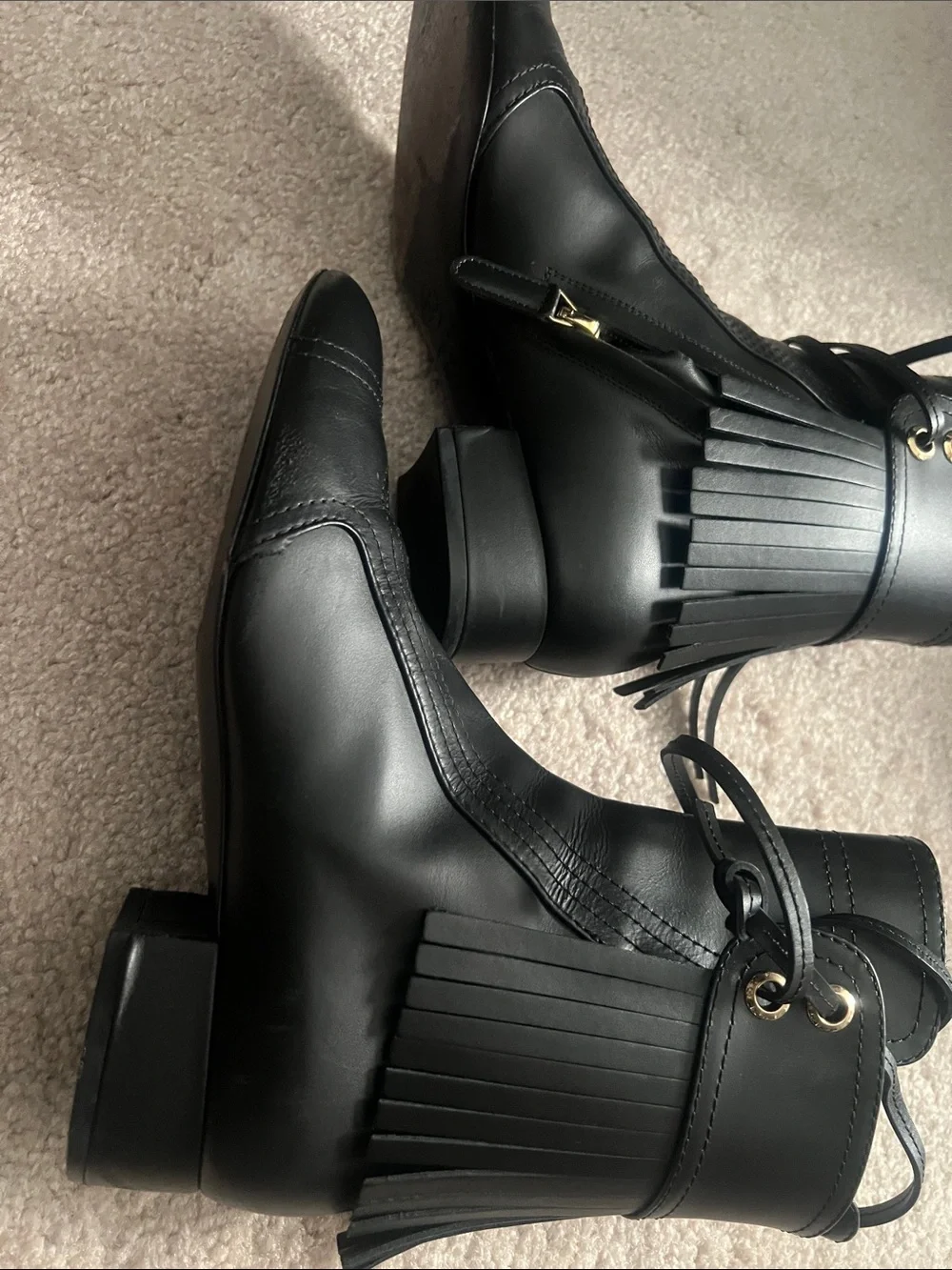 CHANEL Black Leather Heeled Ankle Boots with CC Embossing